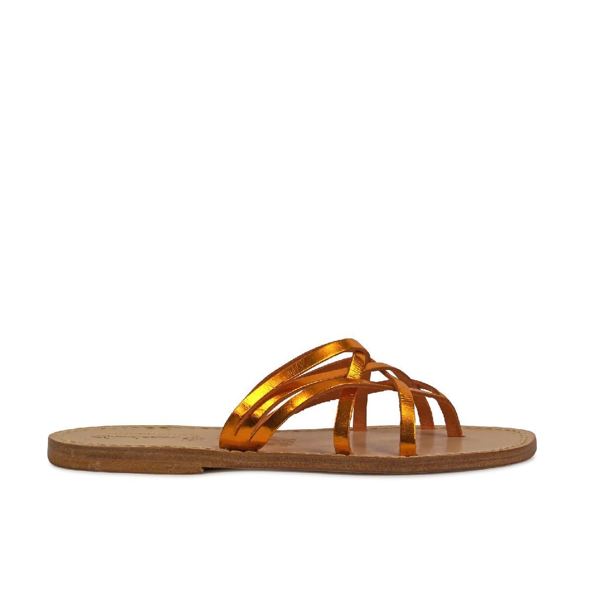 Ladies thong slippers in orange laminated leather