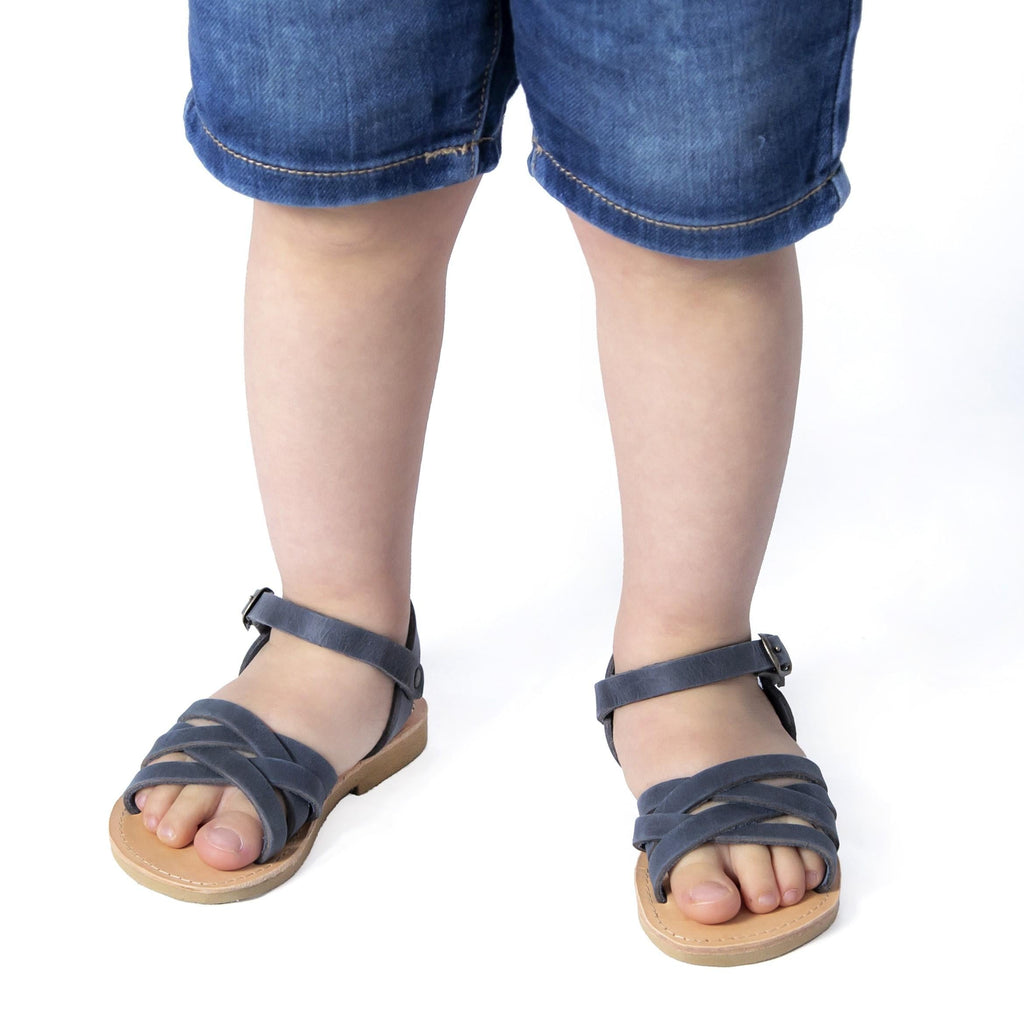 Sandali intrecciati gladiatore da bambino in pelle nubuck blu chiusura con fibbia