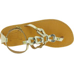 Sandali infradito da donna con lacci incrociati fatti a mano in pelle di vitello laminata oro