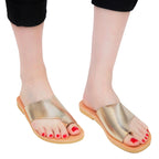 Sandali infradito slip-on da donna fatti a mano in pelle di vitello laminata oro